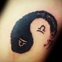 Homemade style black ink arm tattoo of Yin Yang symbol