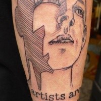 Homemade style black ink arm tattoo of human face with lettering