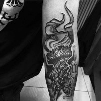 Homemade style black ink arm tattoo of skeleton hand holding torch