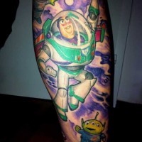 Homemade style carelessly painted colored leg tattoo of Toy story space soldier hero with funny aliens