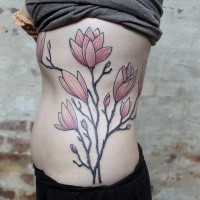 Homemade style colored side tattoo of big flowers