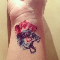 Homemade style colored wrist tattoo of roaring lion
