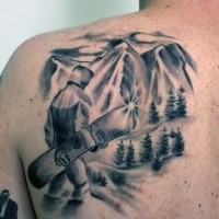 Homemade style detailed scapular tattoo of man with snowboard and mountains