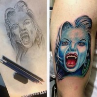 Horrifying colored realistic hungry lady vampire colored biceps tattoo