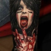 Horror movie like colored bloody crazy woman with knife tattoo on arm