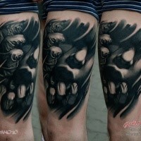 Horror style black and white thigh tattoo of woman portrait with hands