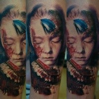 Horror style colored leg tattoo of terrifying looking girl