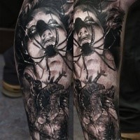 Horror style creepy looking leg tattoo of creepy woman with human heart