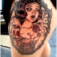 Horror style creepy looking thigh tattoo of monster woman with apple