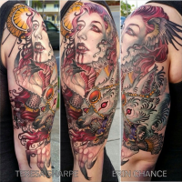 Horror themed colored bloody vampire woman tattoo on half sleeve combined with demonic dog and sun