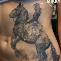Horsewoman on a dark horse tattoo on belly by katerina mikky
