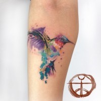 Colour splashes hummingbird tattoo