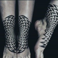 Tatuaje de ornamento de estilo dotwork hipnótico en las piernas