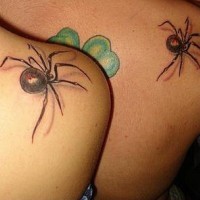 Identical spider tattoos on friends
