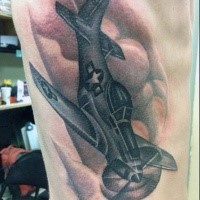 Illustratives großes farbiges Seite Tattoo mit Kampfflugzeug