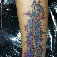 Illustrative style arm tattoo of fantasy tree with moon and cats