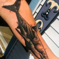 Illustrative style black and white forearm tattoo of big shark
