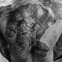 Illustrative style black and white whole back tattoo of powerful werewolf