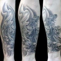 Illustrative style black ink arm tattoo of Cerberus with human skulls