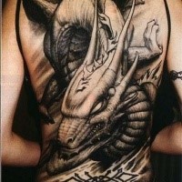 Illustrative style black ink whole back tattoo of big fantasy dragon
