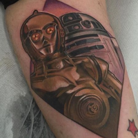 Illustrative style colored arm tattoo of C3PO and R2D2