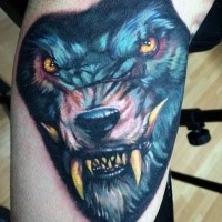Illustrative style colored arm tattoo of werewolf with big teeth