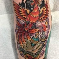 Illustrative style colored arm tattoo of phoenix bird with magic potion and book