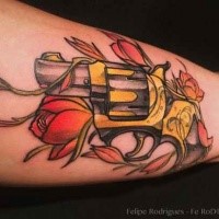 Illustrative style colored arm tattoo of small pistol with flowers