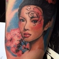 Illustrative style colored arm tattoo of Asian woman with flowers