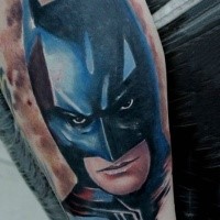 Illustrative style colored arm tattoo of Batman