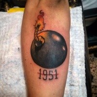 Illustrative style colored arm tattoo of bomb with date