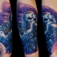 illustrative style colored arm tattoo of famous rock singer