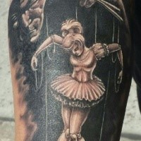 Illustrative style colored arm tattoo of dancing puppet