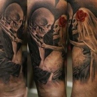 Illustrative style colored arm tattoo of skeleton wedding couple