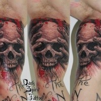 Illustrative style colored biceps tattoo fo bloody skull with lettering