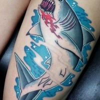 Illustrative style colored bloody shark tattoo on thigh