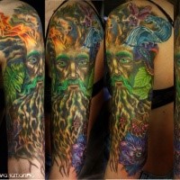 Illustrative style colored fantasy nature man tattoo on sleeve with flowers