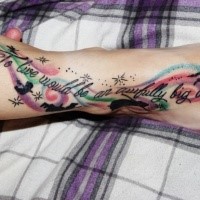 Illustrative style colored foot tattoo of Peter Pan and lettering