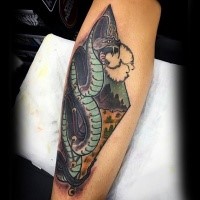 Illustrative style colored forearm tattoo of snake in night desert