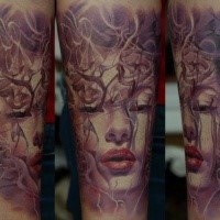 Illustrative style colored forearm tattoo of mystical woman portrait