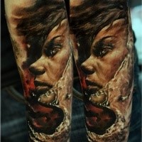 Illustrative style colored forearm tattoo of woman face