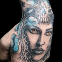 Illustrative style colored hand tattoo of fantasy woman face with skull