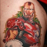 Illustrative style colored Iron Man tattoo on thigh