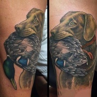 Illustrative style colored leg tattoo of hunters dog and duck