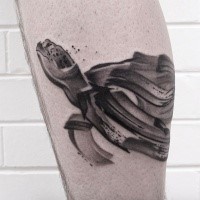 Illustrative style colored leg tattoo of swimming turtle