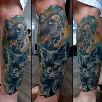 Illustrative style colored leg tattoo of cute cats
