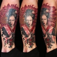 Illustrative style colored leg tattoo of geisha with leaves