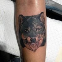 Illustrative style colored leg tattoo of wolf head