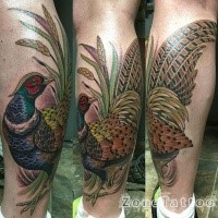 Illustrative style colored leg tattoo of big beautiful bird