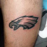 Illustrative style colored leg tattoo of American sports team emblem